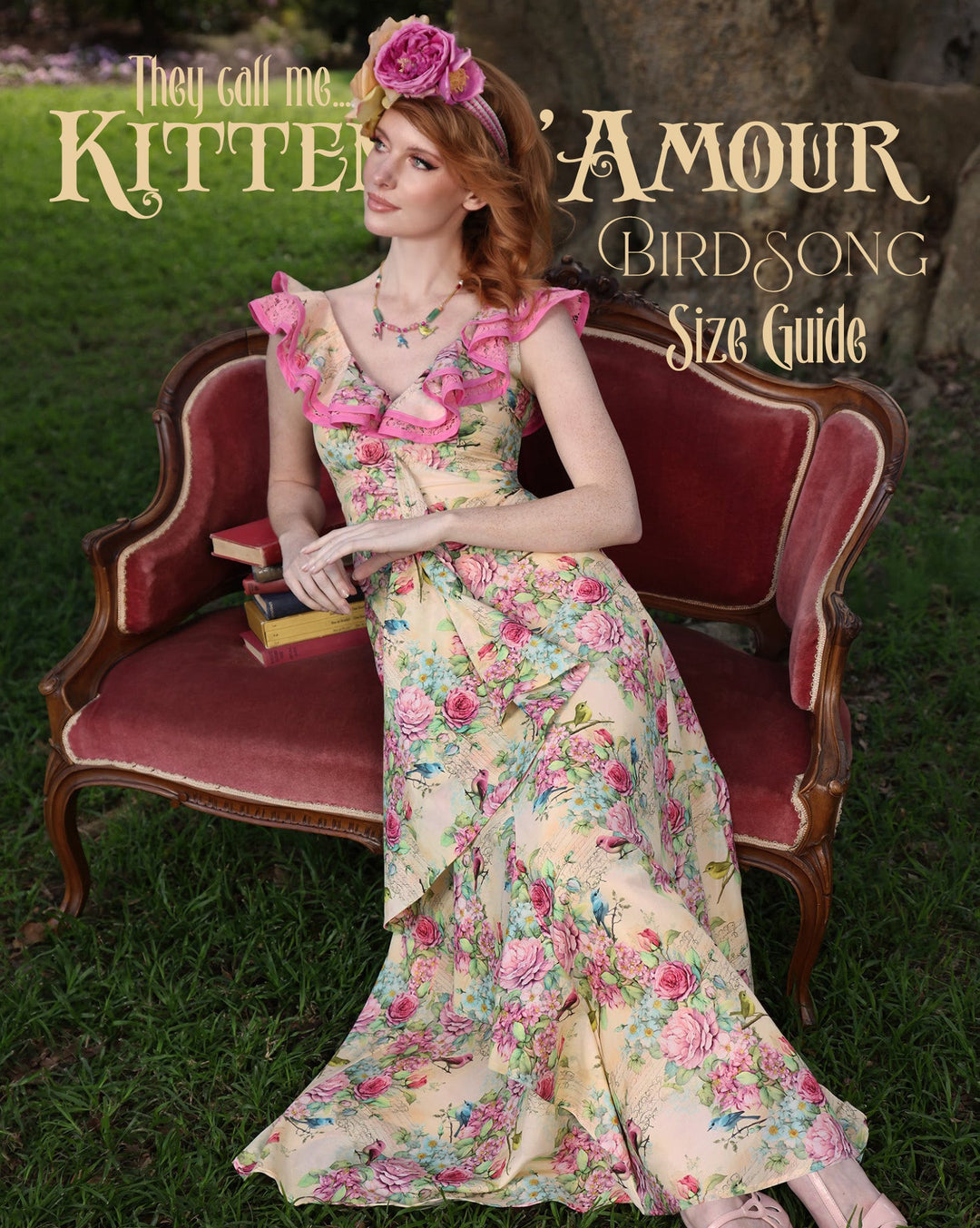 Caitlin is seated on a love seat wearing her Birdsong Maxi Dress